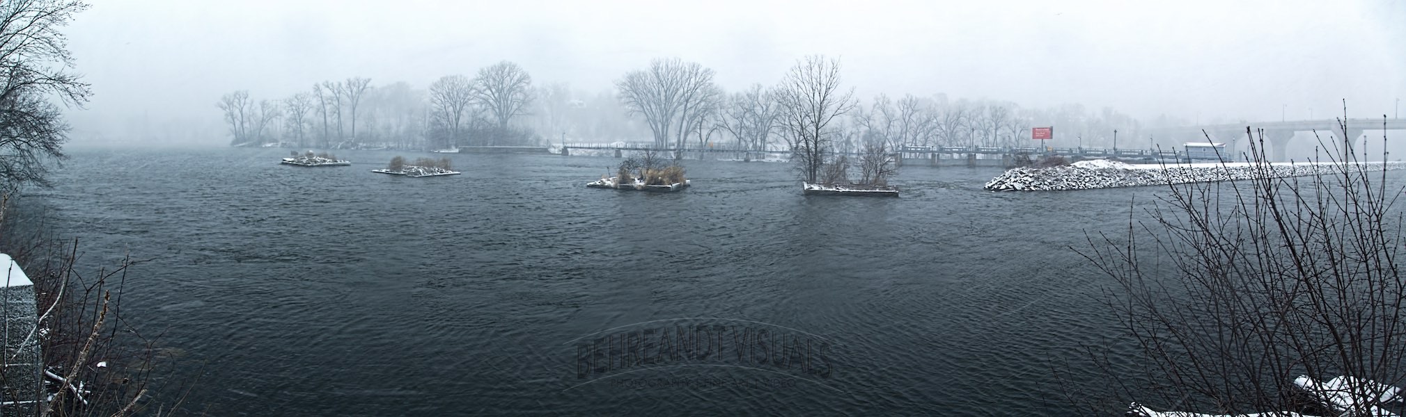 Panoramic view of the Fox River in Appleton, Wisconsin during a snow storm.